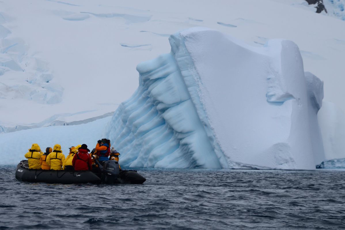 02B Zodiac Near An Iceberg That Has Fallen Over Near Danco Island On Quark Expeditions Antarctica Cruise
